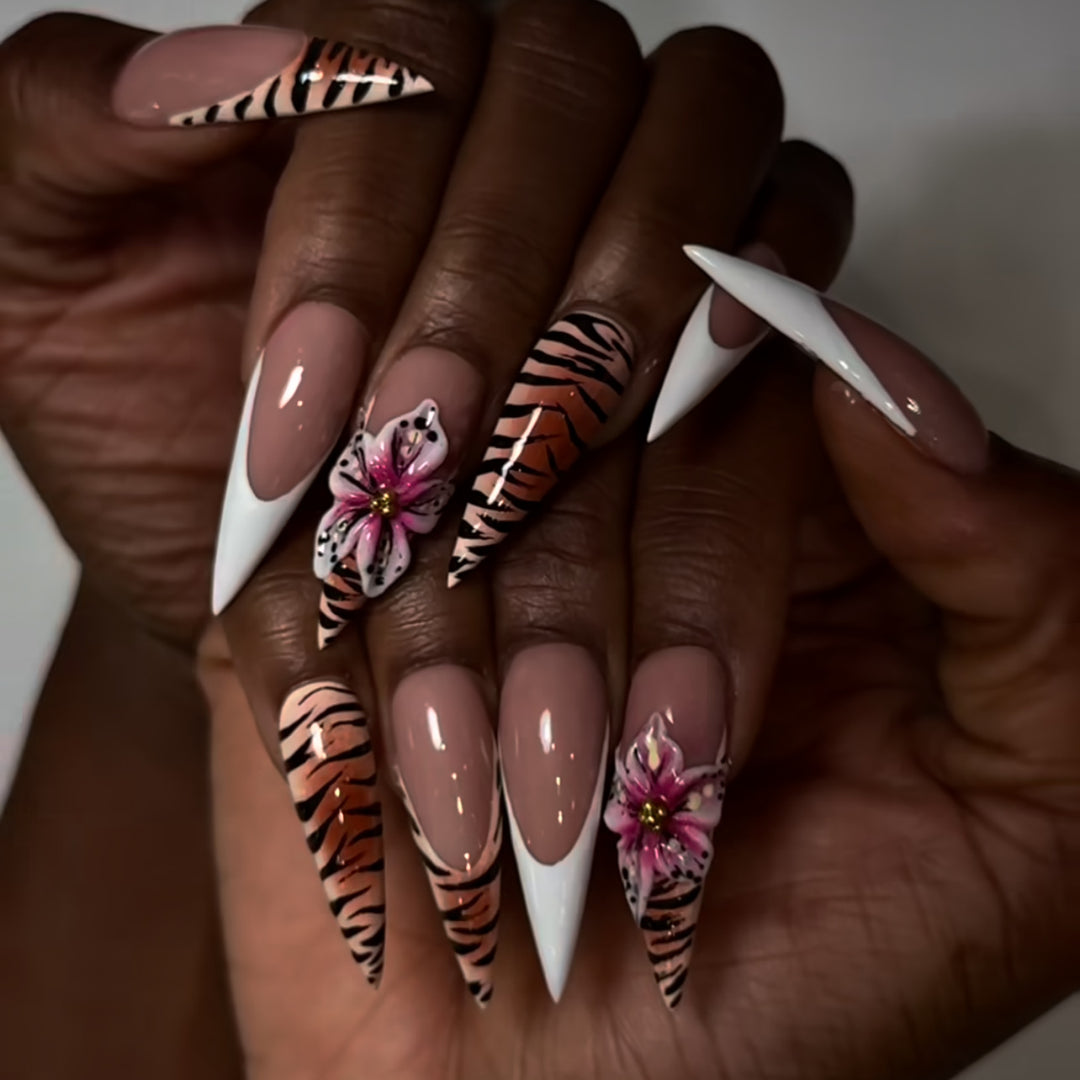 Artful stiletto nails with floral and animal design Bowlift