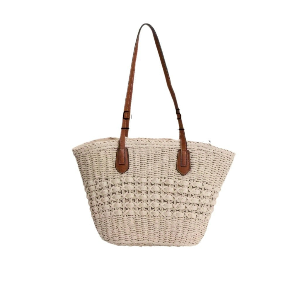 Natural basket bag with elegant leather handles Bowlift