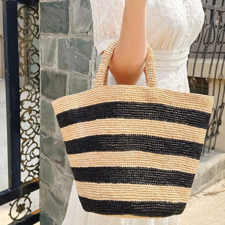 Handwoven beach bag in modern striped pattern Bowlift