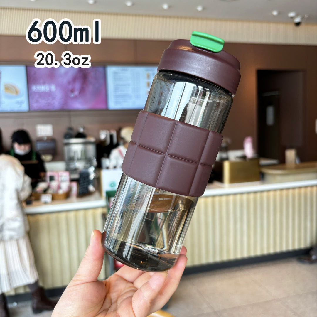 Women's transparent drinking bottle with non-slip silicone coating Bowlift