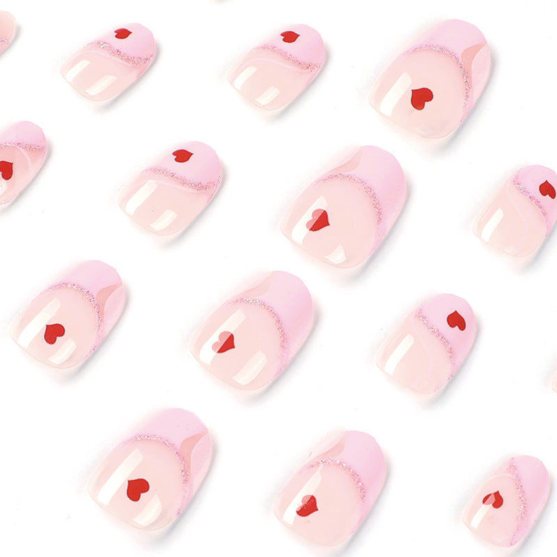 Artistic Nail Extensions with Heart Motif Bowlift