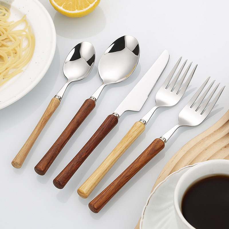 Elegant serving spoon with ergonomic wooden handle Bowlift