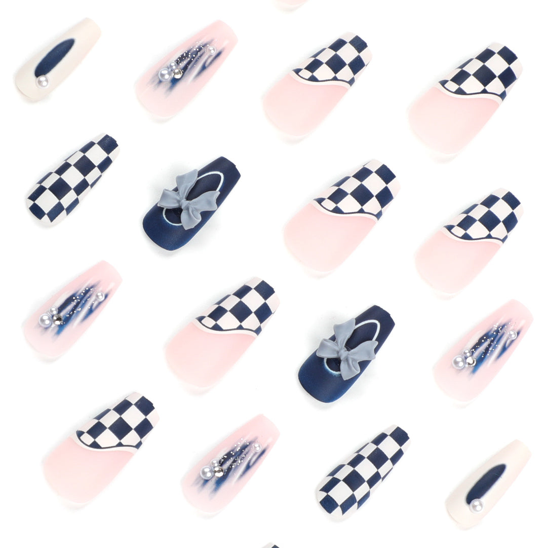 Artful nail decoration with bows and plaid pattern Bowlift