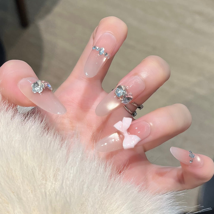 Elegant Nail Art Extensions with Pearl Accents Bowlift