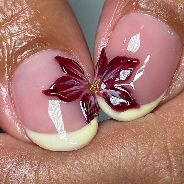 Artful fingernails with floral details Bowlift