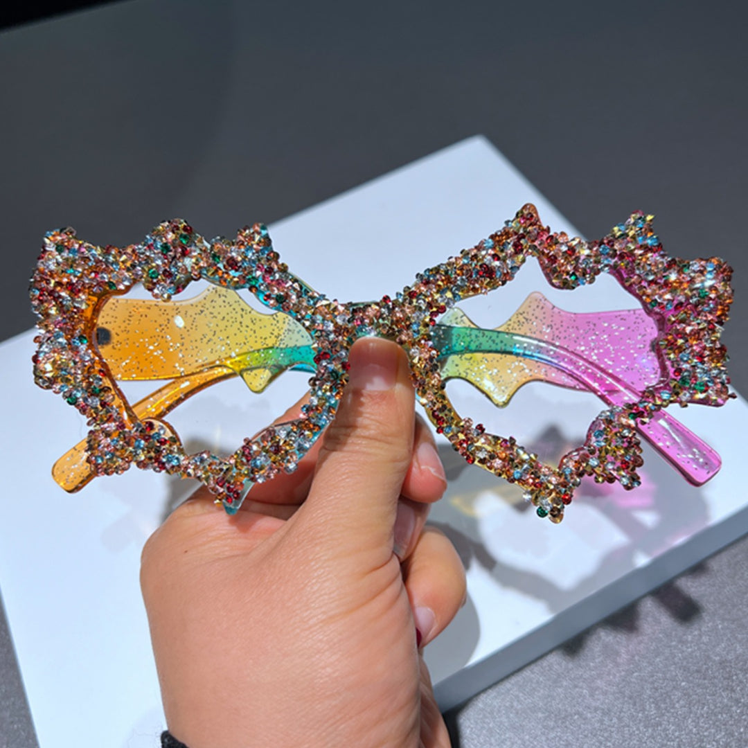 Ladies creative sunglasses in an extravagant design with glitter embellishments Bowlift