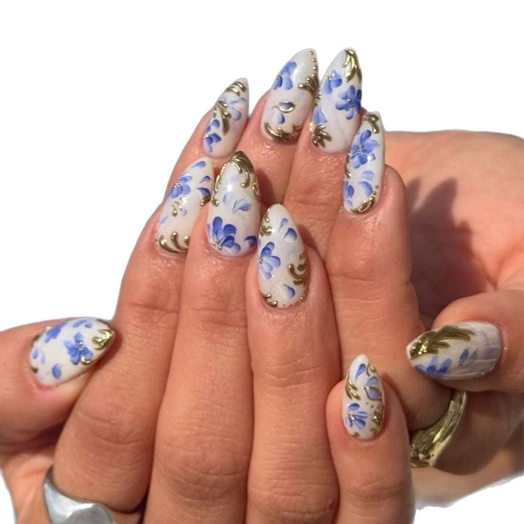 Artificial nails with exquisite floral and gold accents Bowlift
