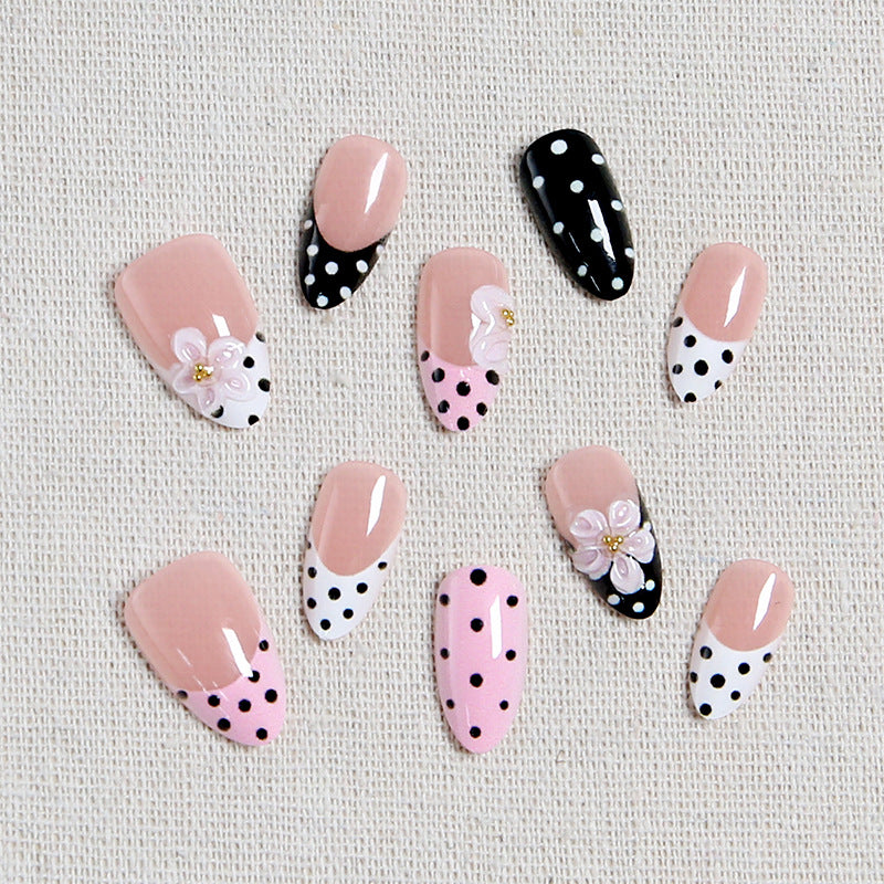 Nail art set with floral accents and elegant dots Bowlift