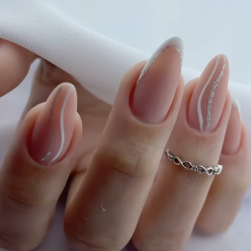 Elegant Stiletto Press-On Nail Art with Rhinestone Accents Bowlift