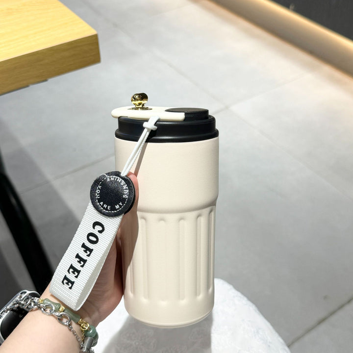 Ladies insulated cup with practical carrying strap Bowlift