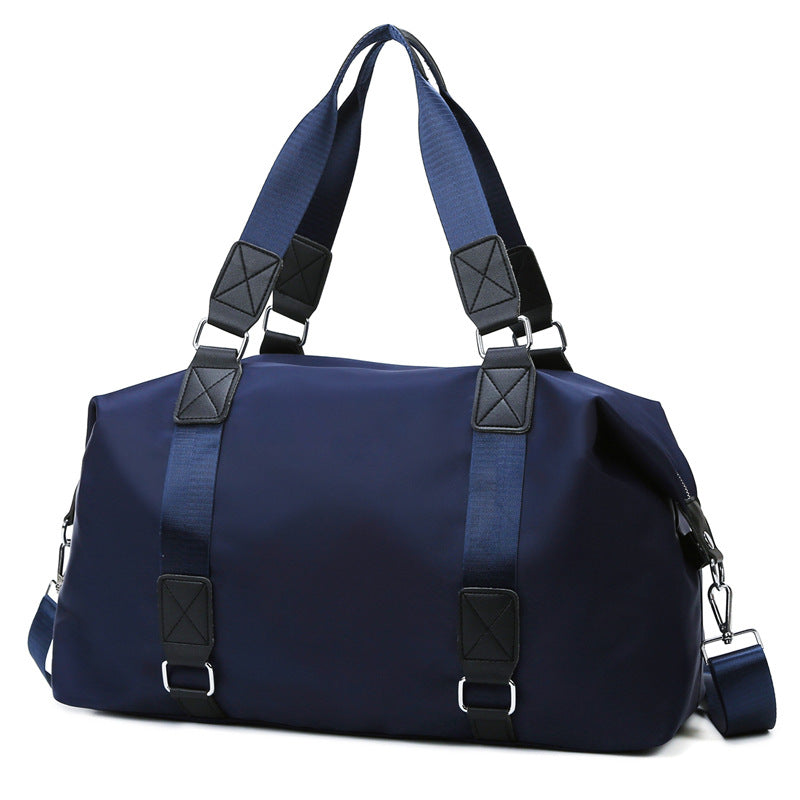 Sports bag with ergonomic carrying handles and versatile interior Bowlift