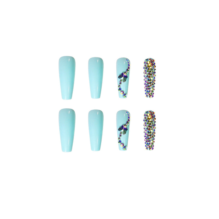 Glamorous artificial nails with sparkling rhinestone embellishments Bowlift