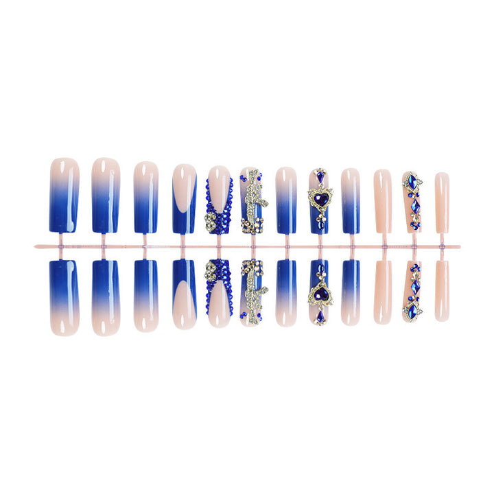 Acrylic nail set with elegant ombre design and sparkling embellishments Bowlift