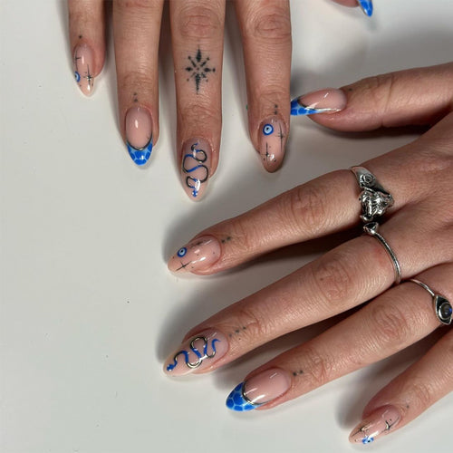 Artistic Stiletto Press-On Nails with Decorative Blue Elements Bowlift
