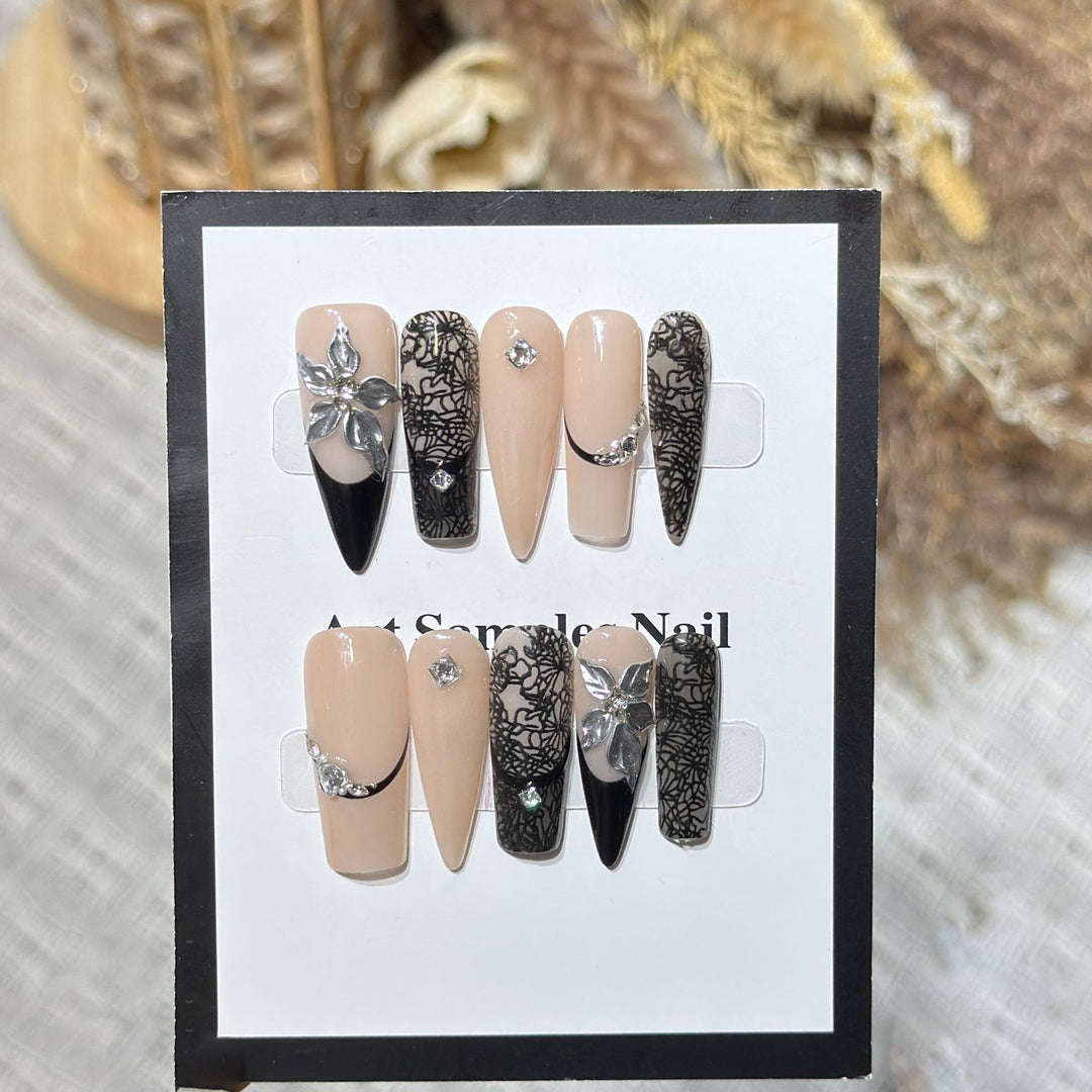 Artistic Stiletto Press-On Nail Set with Floral Accent Bowlift