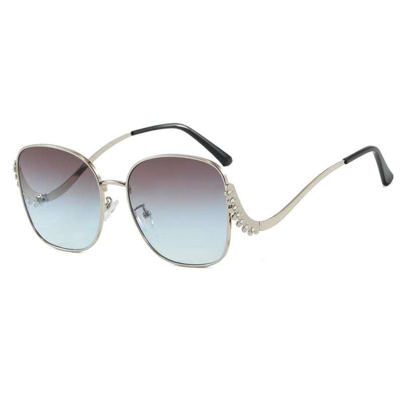Women's striking sunglasses with sparkling appliqués Bowlift