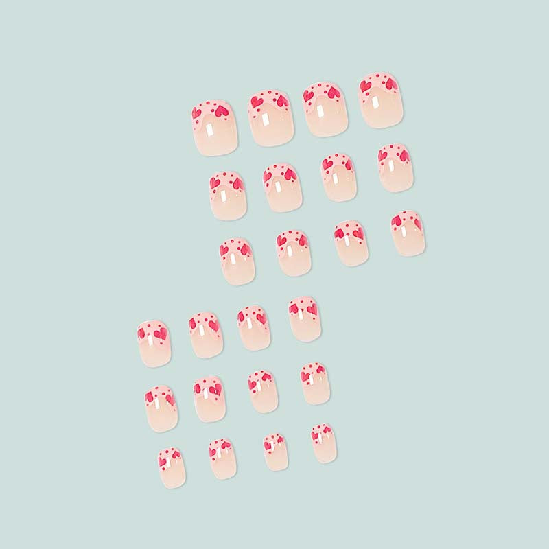 Artfully designed nail tips with heart motifs Bowlift
