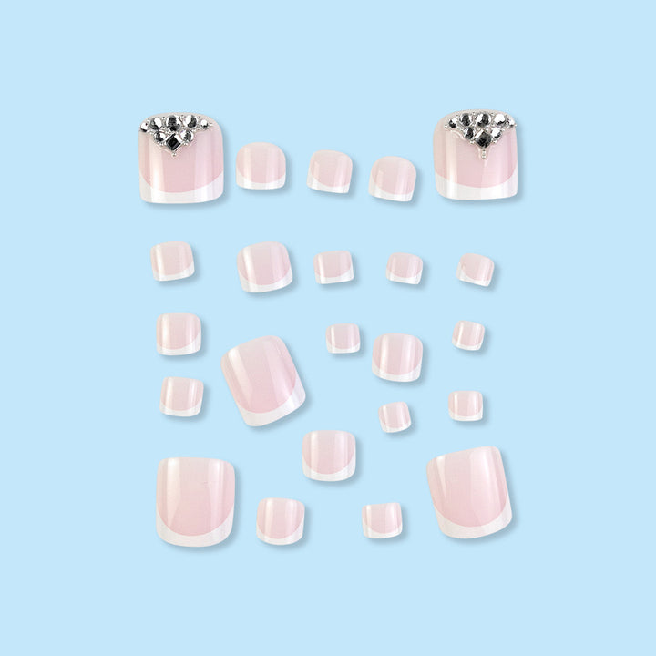 Nail art set with elegant French tips and sparkling rhinestone details Bowlift