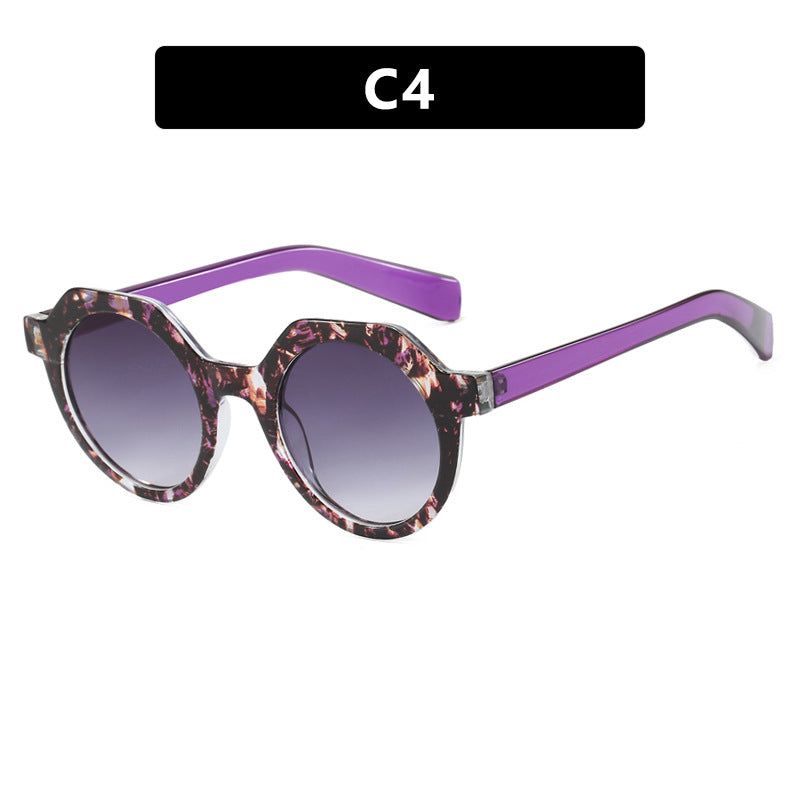 Ladies extravagant round sunglasses with colored accented frame Bowlift