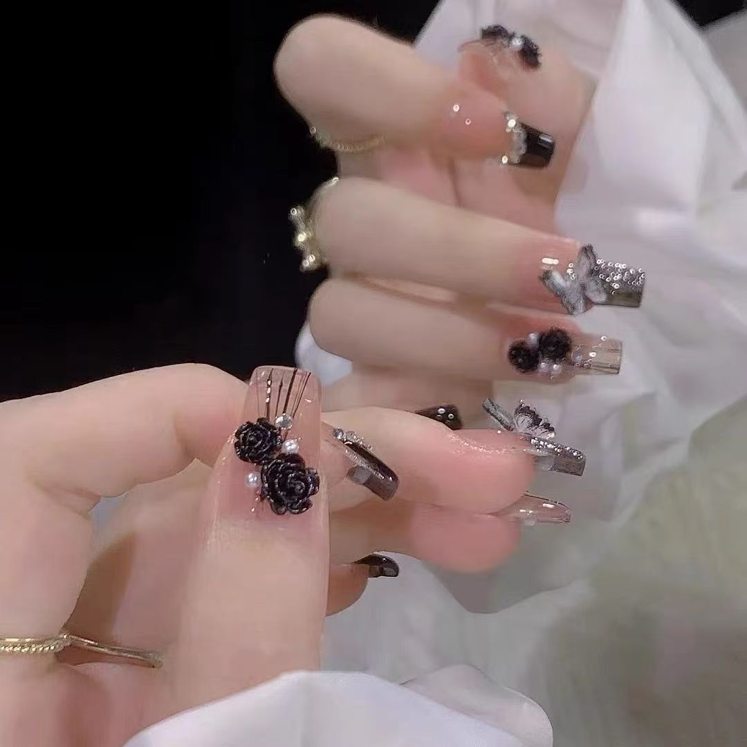 Elegant nail design with bow and rhinestone details Bowlift