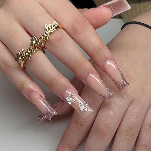 Artistic Long Glossy Almond-Shaped Nail Extensions Bowlift