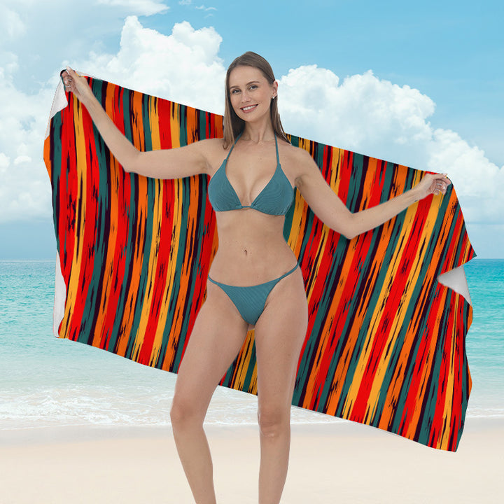 Beach towel with vibrant tropical plant motif Bowlift