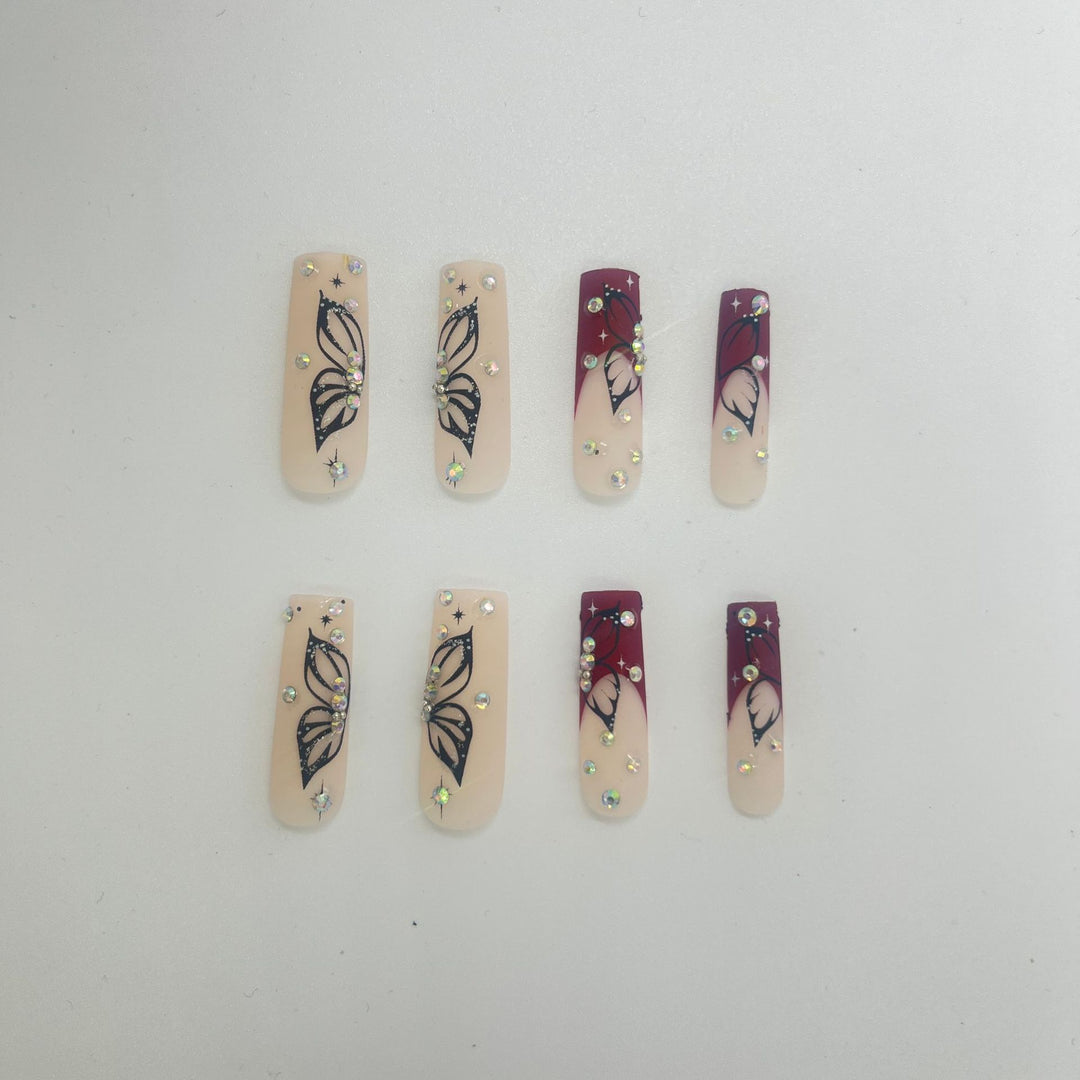 Artistic Long Nail Extensions with Butterfly Design Bowlift