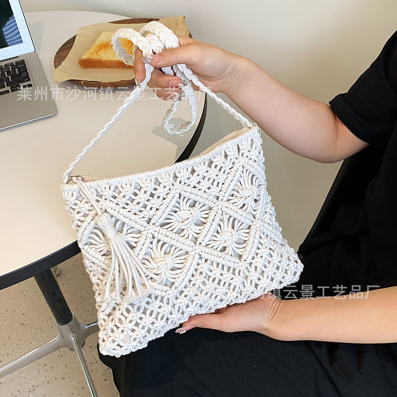 Hand-knotted shoulder bag with tassels and geometric pattern Bowlift