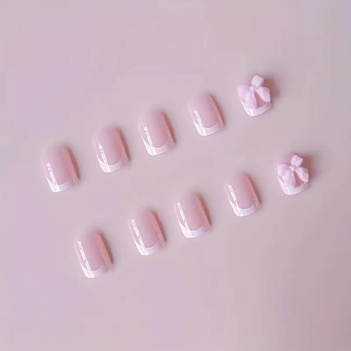 Elegant French Tip Press-On Nails with Bow Detail Bowlift