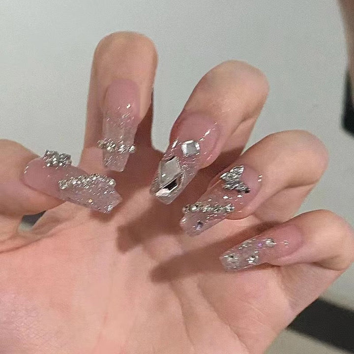 Elegant Nail Art with Glitter and Rhinestones Bowlift