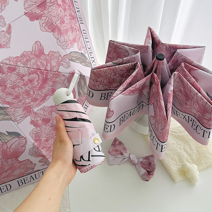 Women's compact umbrella with floral design Bowlift