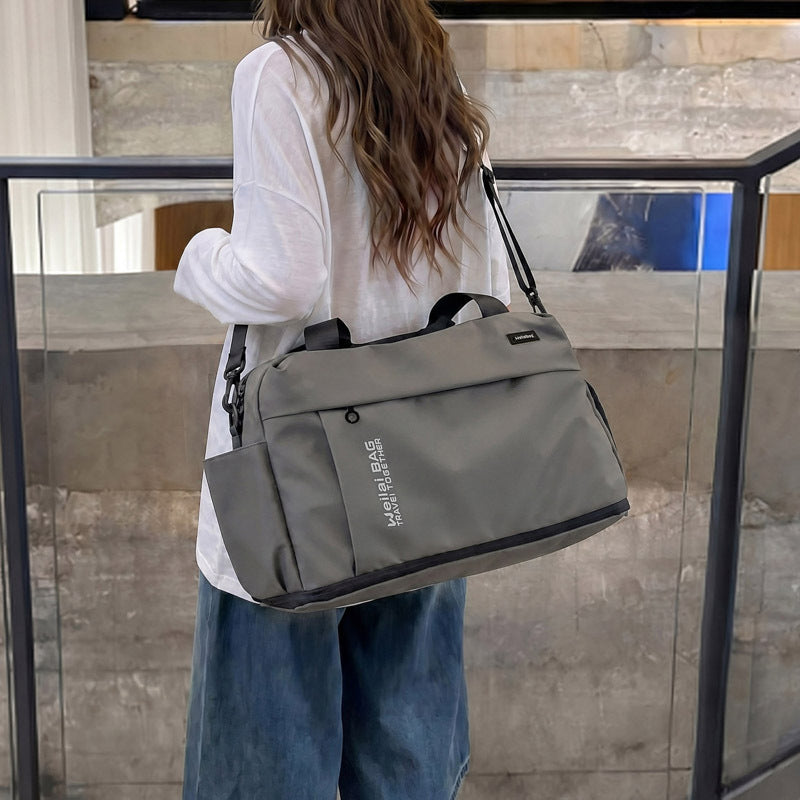 Travel and Sports Bag with Water-Repellent Material and Many Compartments Bowlift