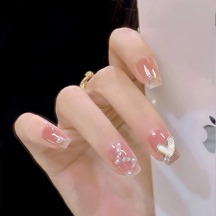 Artificial nail set with elegant pearl and glitter accents Bowlift