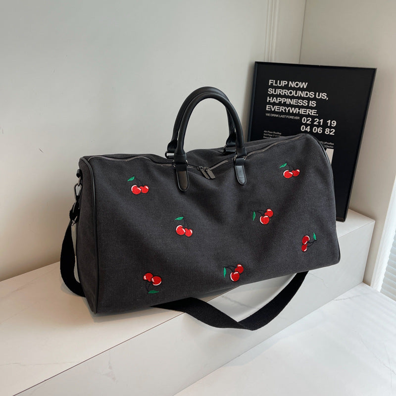 Sporty weekend bag with playful cherry pattern Bowlift