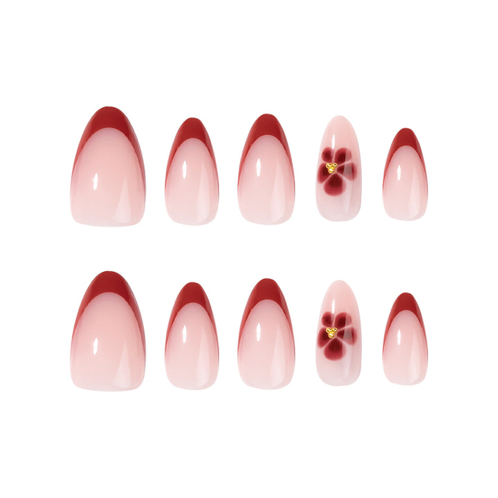 Elegant and artistically designed stiletto nails with flower design Bowlift