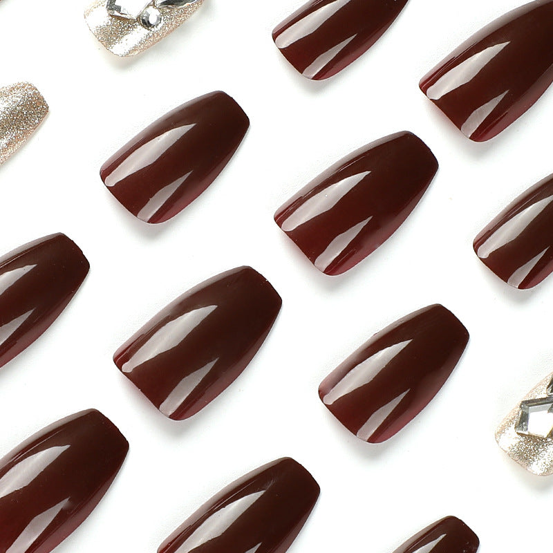 Artfully designed Gel nails with rhinestone decorations Bowlift