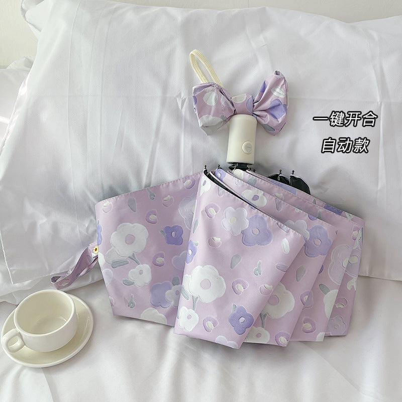 Women's Automatic Folding Umbrella with Floral Design and Practical Storage System Bowlift