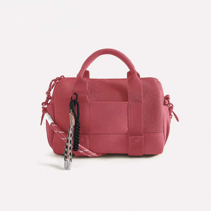 Practical sports bag with mesh structure and removable shoulder strap Bowlift