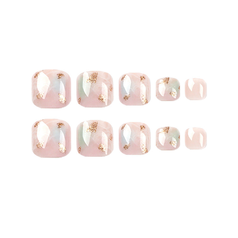 Artful toenail art with elegant marble and gold accents Bowlift