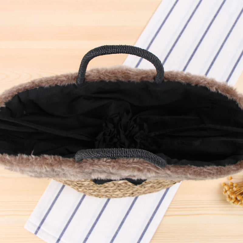 Braided handbag with luxurious faux fur trim Bowlift