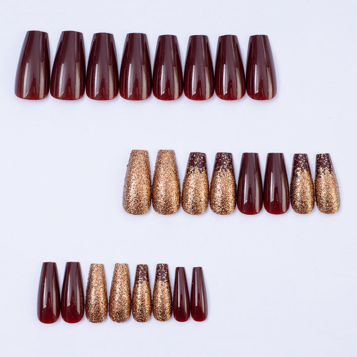 Glamorous artificial nails with glitter and elegant embellishments Bowlift