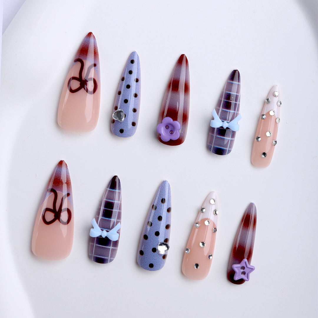 Artificial nails with creative 3D design and playful accents Bowlift
