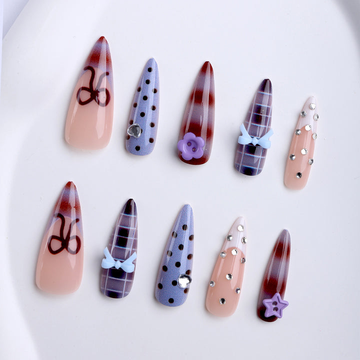 Artificial nails with creative 3D design and playful accents Bowlift