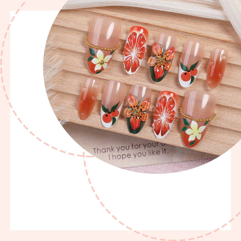 Artificial nail set with colorful flower and glitter accents Bowlift