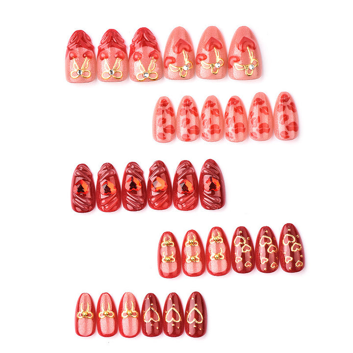 Festive artificial nails with romantic heart designs Bowlift