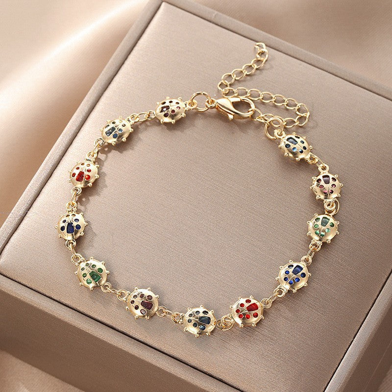 Butterfly and Daisy Charm Anklet Bowlift