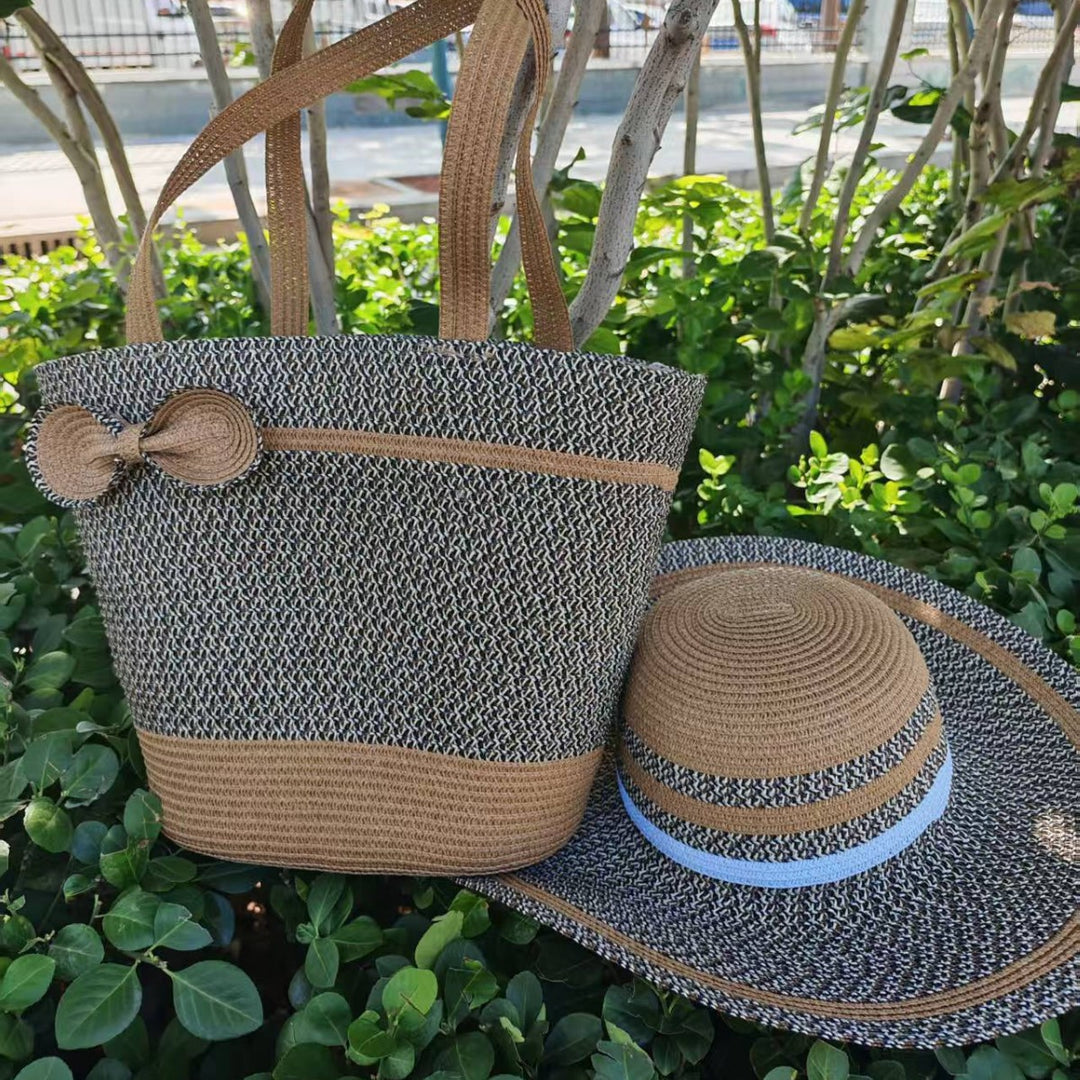 Elegant sun hat with wide brim and subtle stripe pattern Bowlift