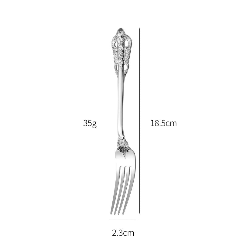 Elegant fish fork with artistic handle design Bowlift