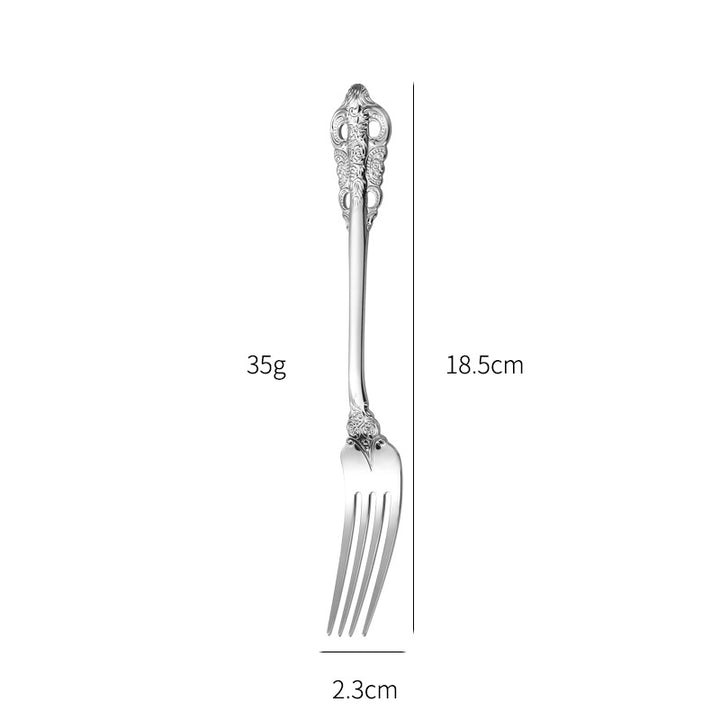 Elegant fish fork with artistic handle design Bowlift