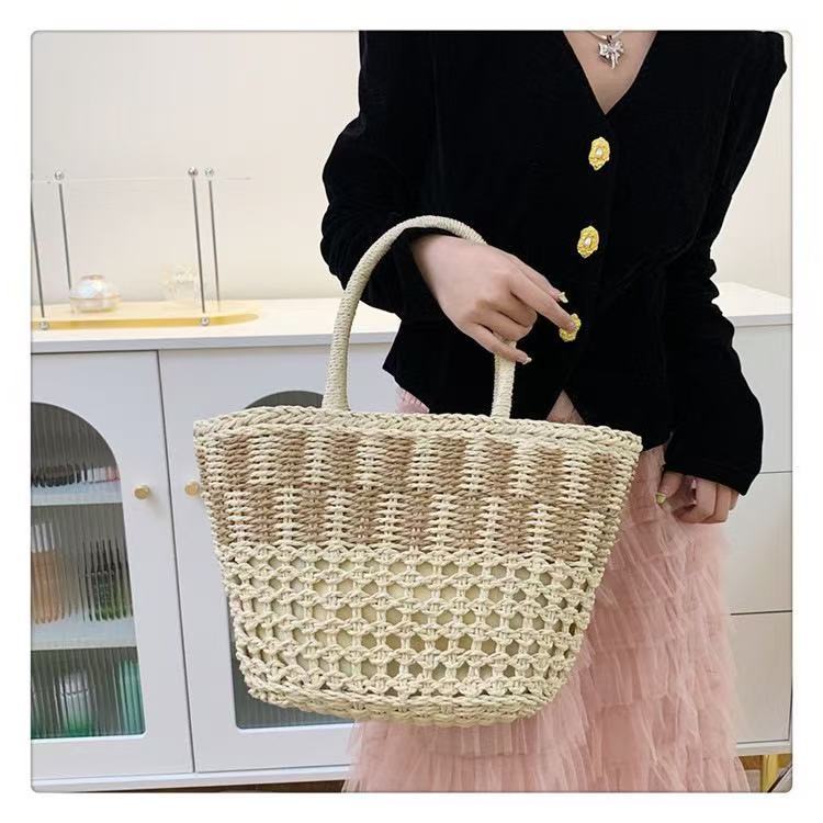 Handwoven basket bag with airy structure Bowlift